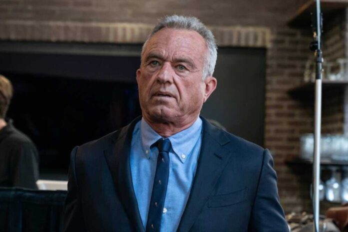 shutterstock_2456684687.jpg featured image Robert F Kennedy JR in suit indoors.