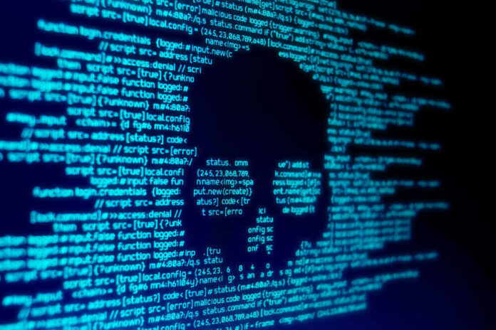 shutterstock_1050436496.jpg featured image Skull silhouette in blue computer code background.