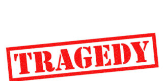 Red tragedy stamp on white background