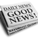 Stack of newspapers with headline Good News