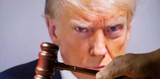 Gavel in front of Donald Trump's face on screen.