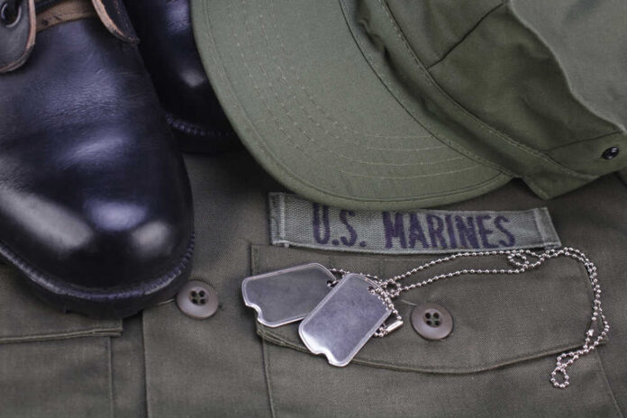 shutterstock_1630141729.jpg featured image US Marines uniform with boots and dog tags