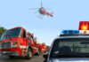 Fire truck police car and helicopter at scene