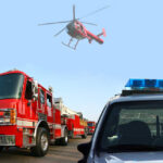 Fire truck police car and helicopter at scene