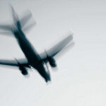 Probe Begins for Midair Disaster Over D.C. – 67 Lost Airplane in flight with motion blur