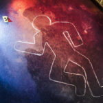 Crime scene chalk outline with numbered evidence markers.