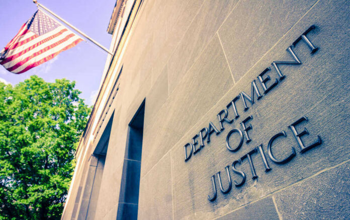 Department of Justice building with American flag