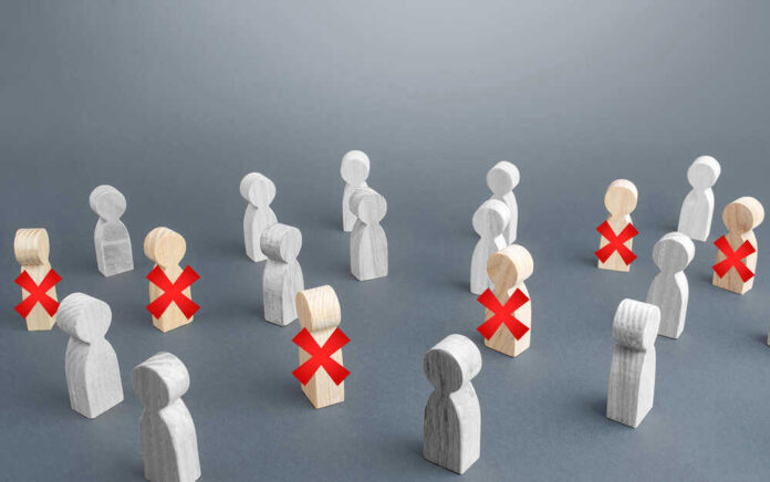 Wooden figures with red X marks, signifying eliminated individuals