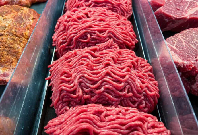 Ground beef on display at a butcher shop.