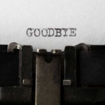 Historic Exodus: 2 Million Flee America Typewriter with paper saying GOODBYE