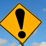 Mall Meltdown Exposes Blue-State Policy Disaster Yellow caution sign with exclamation mark symbol.