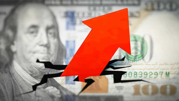 Red arrow on cracked $100 bill.