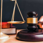 Democrat Judge NUKES Only GOP Seat!? Judge gavel, scales of justice, and law books.
