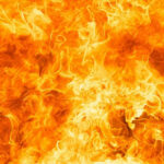 Bright orange and yellow flames burning intensely.
