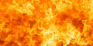 Bright orange and yellow flames burning intensely.