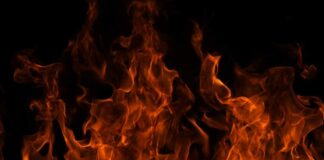 Close-up of vibrant flames against a black background