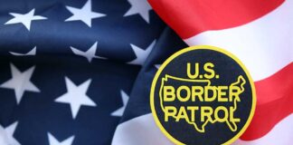 U.S. Border Patrol badge on a background of the American flag