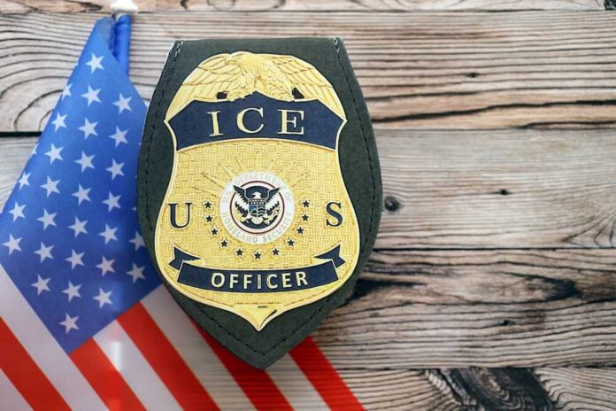 ICE officer badge displayed next to the U.S. flag