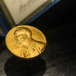 Nobel Prize medal featuring Alfred Nobels profile.