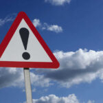 MANHUNT Escalates For Missing TV Star Warning sign with exclamation mark against sky