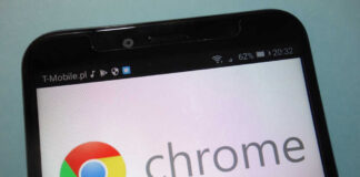 Close-up of a smartphone displaying the Chrome logo and interface