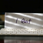 Lib Paper CEO FLEES After Newsroom Massacre Envelope reading I Quit behind keyboard.