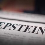 Epstein Fallout Continues: Ambassador Arrested Close-up of a newspaper headline reading 'EPSTEIN'