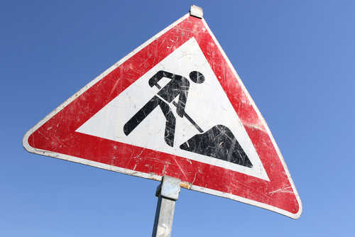 Warning sign indicating construction work ahead