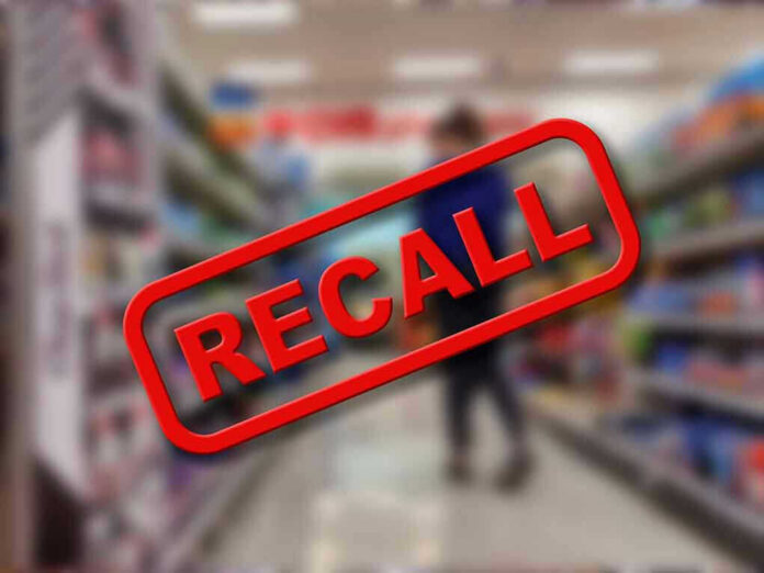 2187841613 Recall stamp on blurred store aisle background.