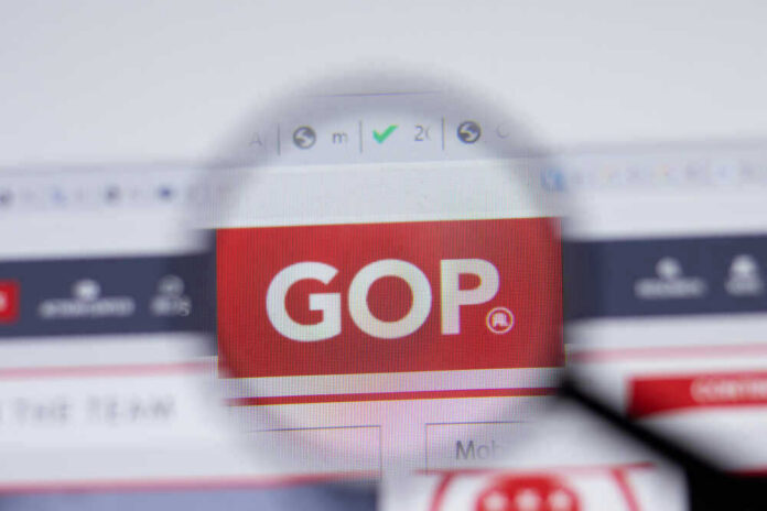 shutterstock_1924605617.jpg Magnifying glass focusing on GOP website logo.