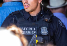 Secret Service Nightmare at Philly Airport Secret Service officer in uniform with equipment visible.