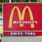 McDonald’s SHOCKS with $3 Deals McDonald's drive-thru sign with iconic golden arches