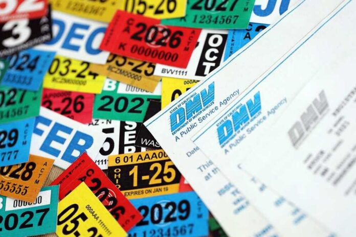 shutterstock_2719907849.jpg A collection of colorful vehicle registration stickers and DMV paperwork