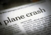 Newspaper headline about a plane crash.