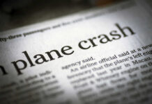 Newspaper headline about a plane crash.