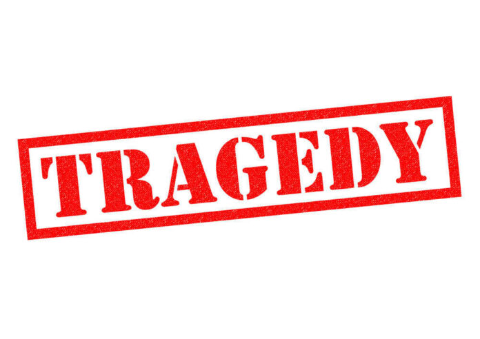 shutterstock_369304193.jpg Red tragedy stamp on white background