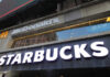 Signage for McDonald's and Starbucks in an urban setting