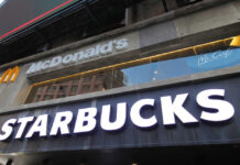Signage for McDonald's and Starbucks in an urban setting