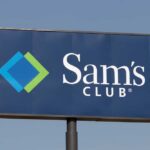 Sign for Sam's Club featuring a blue background and logo