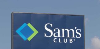 Sign for Sam's Club featuring a blue background and logo