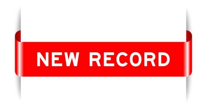 Red ribbon banner with the text 'NEW RECORD'