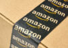 Close-up of an Amazon-branded shipping box tape on a cardboard box