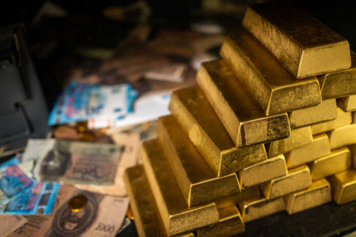 Bank,Vault,With,Gold,And,Cash Stack of gold bars next to scattered banknotes and coins