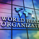 WHO’s Highest Alert: Ebola Threatens Global Safety World Health Organization logo on a colorful glass building