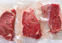 Cookout Shock: $25 Price Gap Stuns Families Three vacuum sealed steaks on a white surface