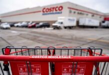 Costco Recall: Dangerous Injury Risk! Shopping cart in front of a Costco Wholesale store