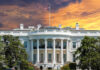 Gunfire Erupts Near White House! Deadly Chaos Unfolds The White House with vibrant sunset sky.