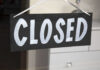 Shocking Beer Shutdown – 177-Year Icon Fades A black sign with the word 'CLOSED' painted in white letters