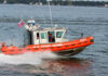 Mystery Grows: Coast Guard Bows Out?! U.S. Coast Guard boat speeding through water
