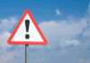 VIDEO: Runaway Horse Carriage, Teen Dead — Who Failed? Triangle warning sign with exclamation mark against sky.